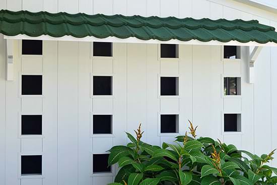 Green metal window awning