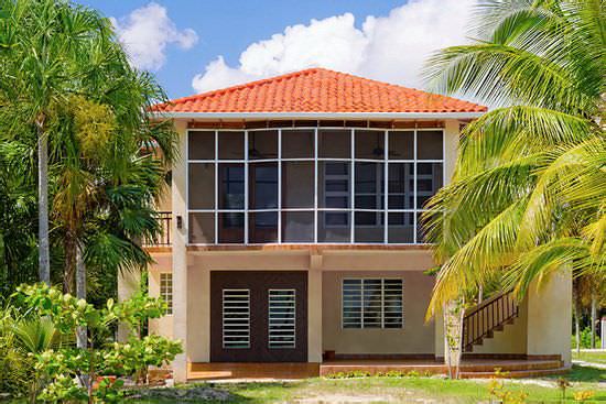 Two-storey house with clay tile roof